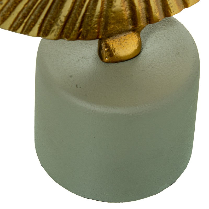 FIGURA ABSTRATA DOURADA BASE VERDE